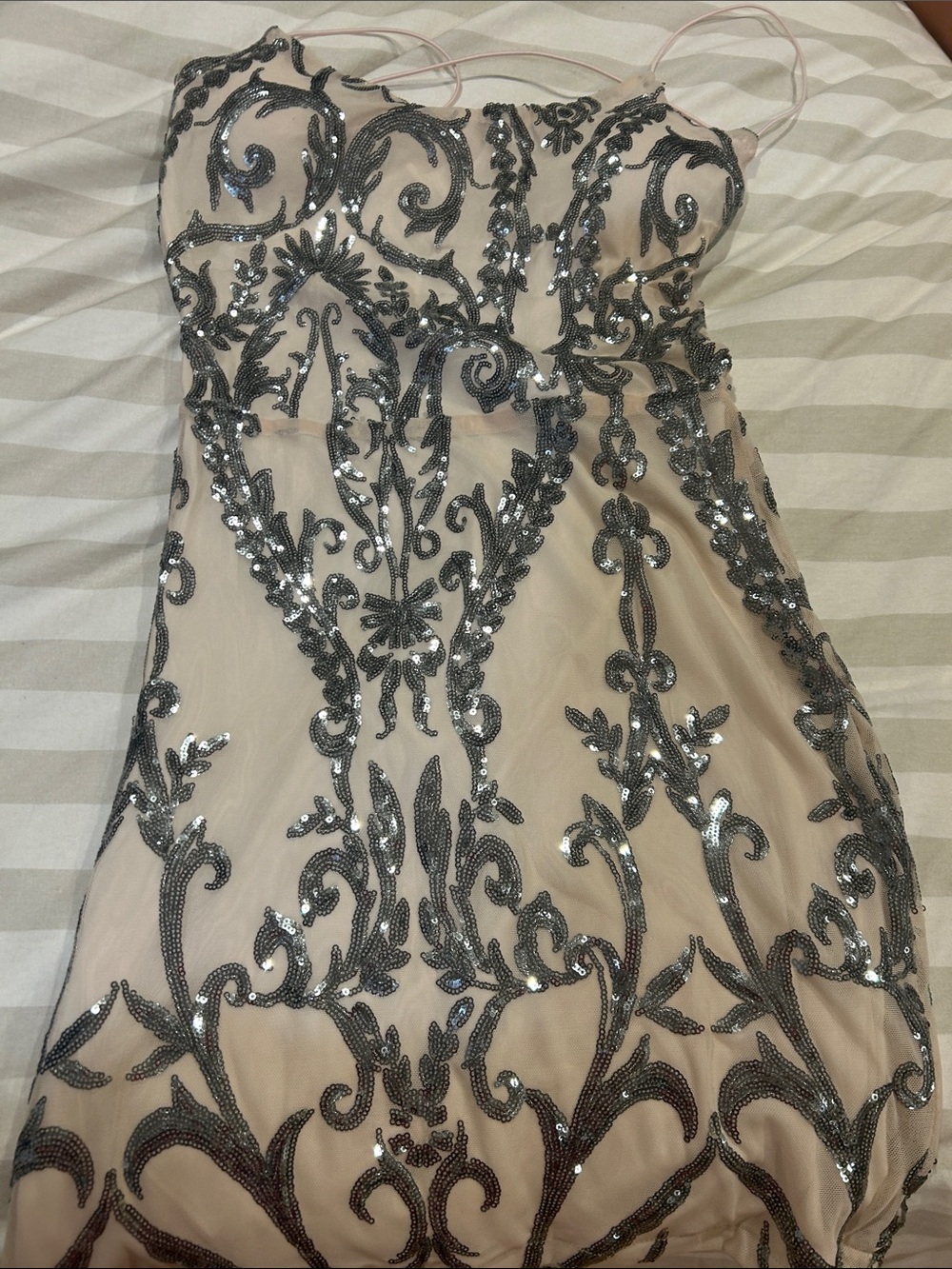 sequin mini dress featuring elaborate silver beaded scrollwork